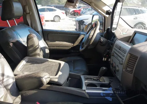 2005 Nissan Titan Le z USA, uszkodzony, nr VIN 1N6AA07BX5N558163